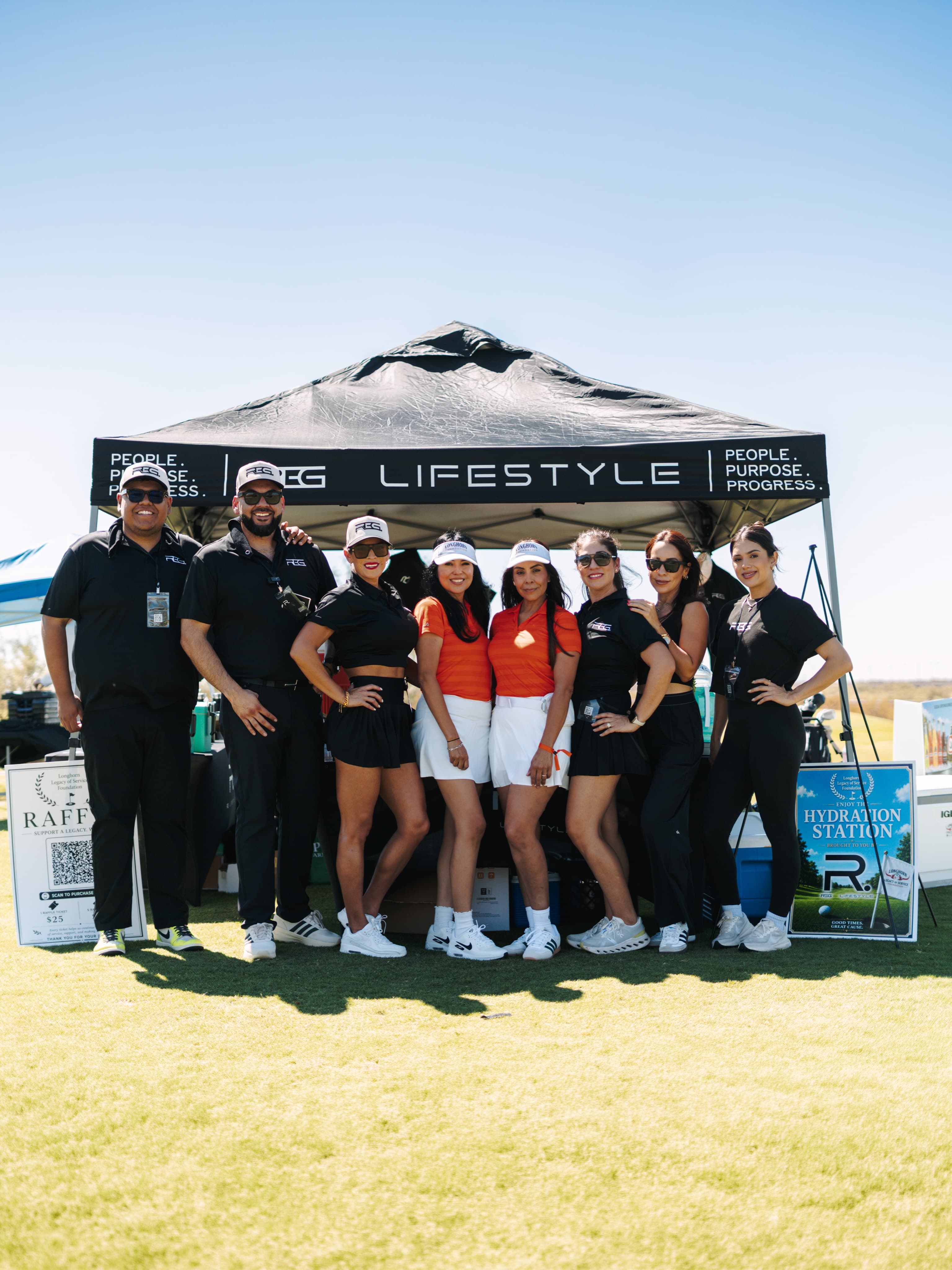 The REG team together at a community event